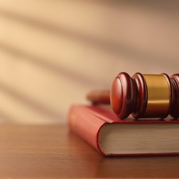 Law book and judges gavel